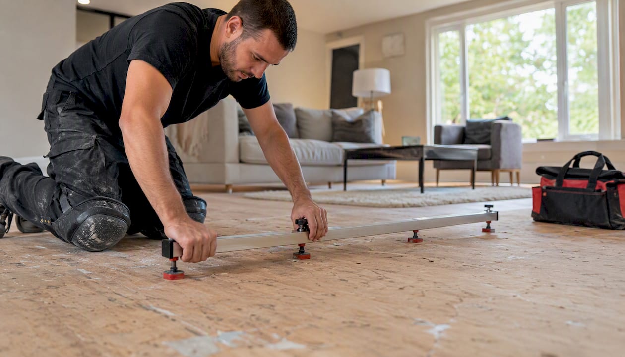 Contractor leveling subfloor for transition install