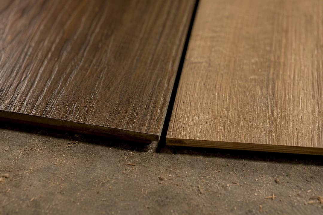 Close-up comparison of laminate flooring surface textures