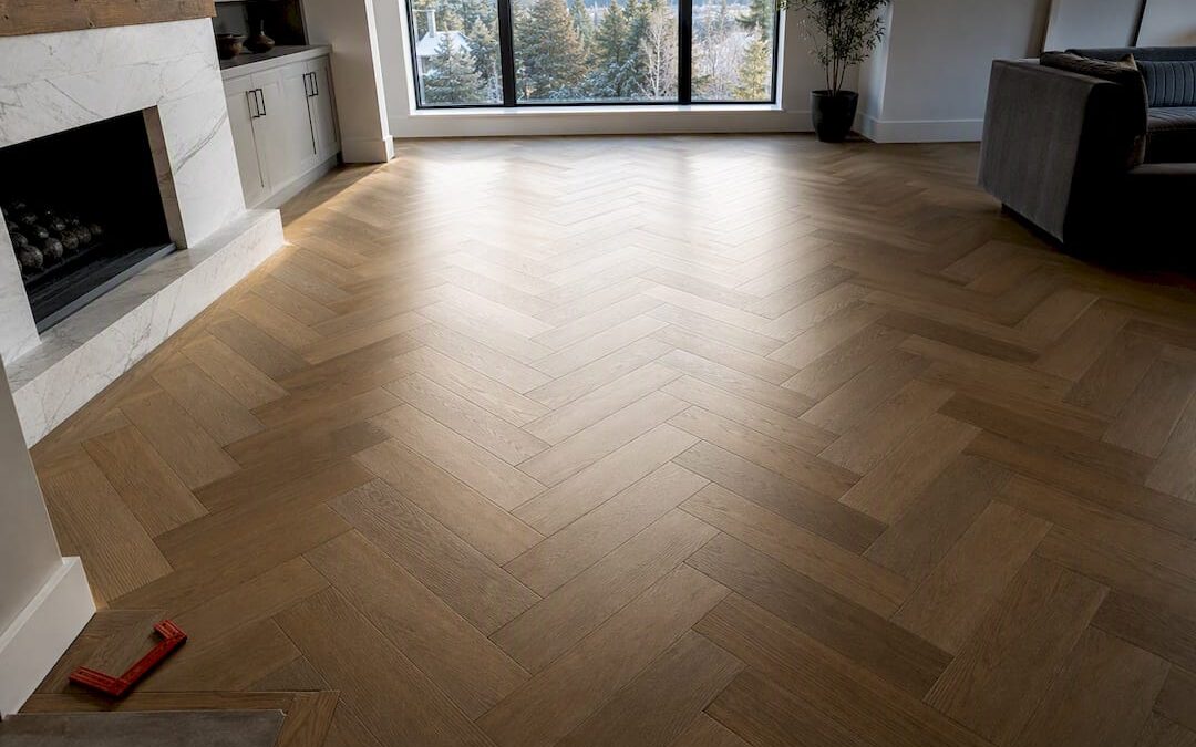 Herringbone hardwood pattern aligned toward window