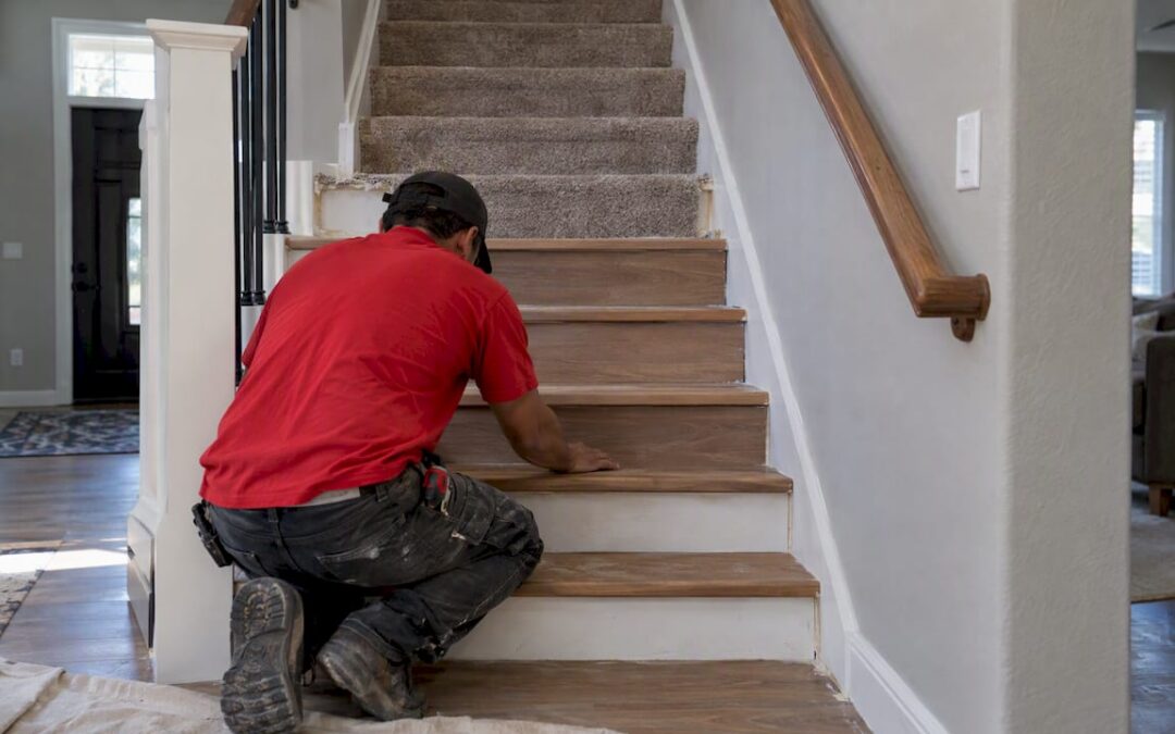 Carpeted stairs transitioning to new wood treads